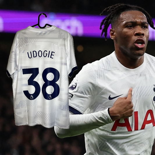 Udogie signed Tottenham shirt.