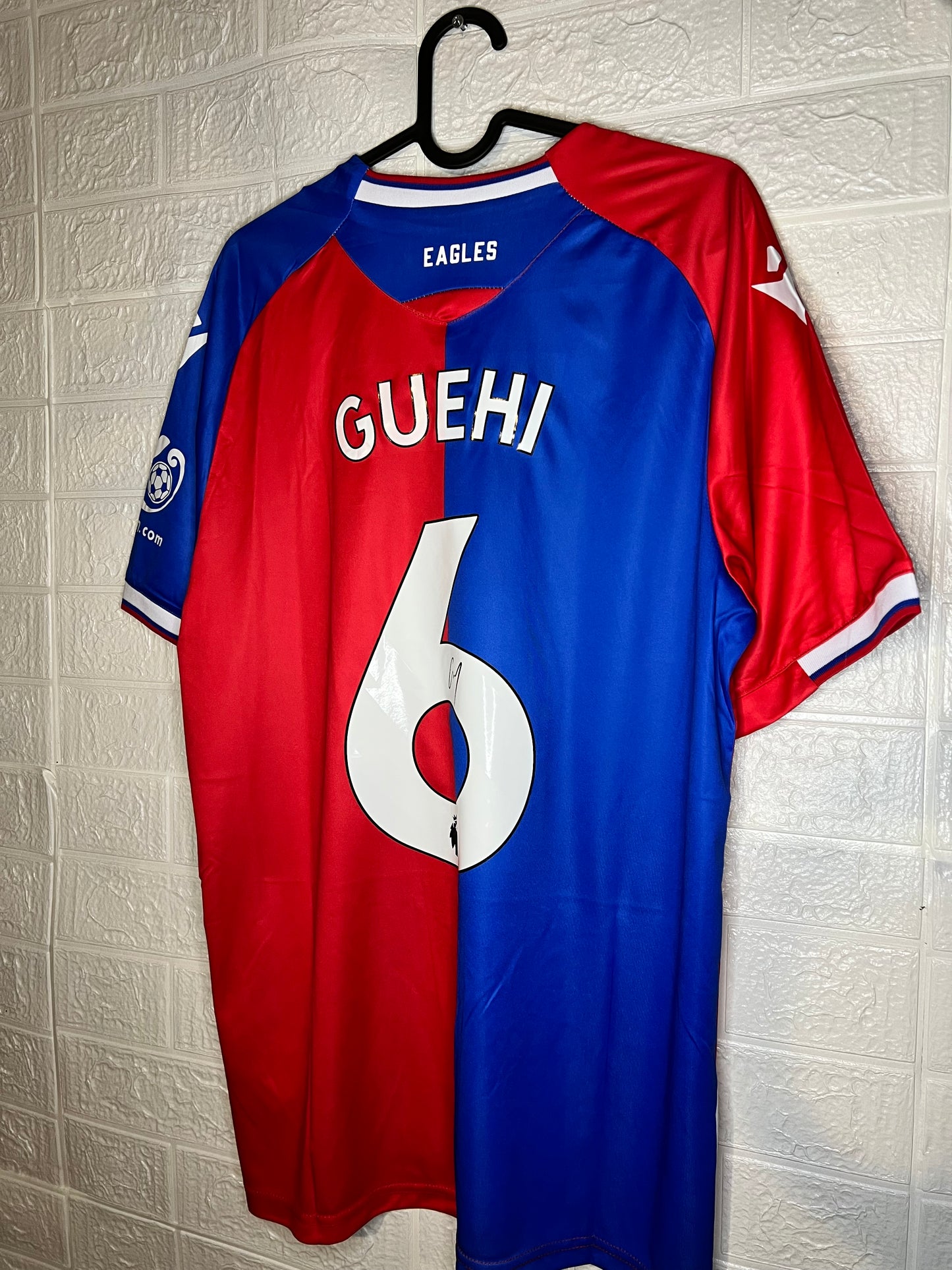 Guehi signed Crystal Palace shirt