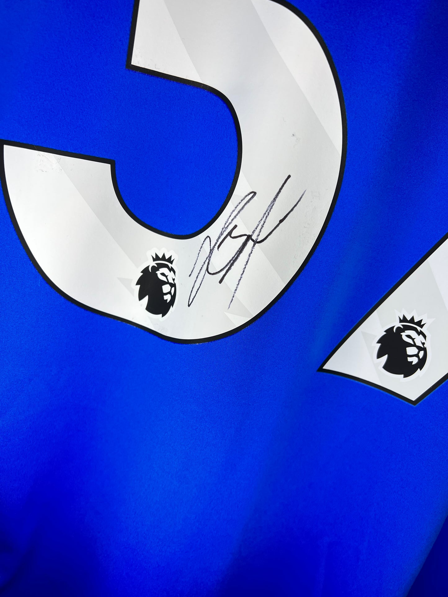 Garner signed Everton shirt.