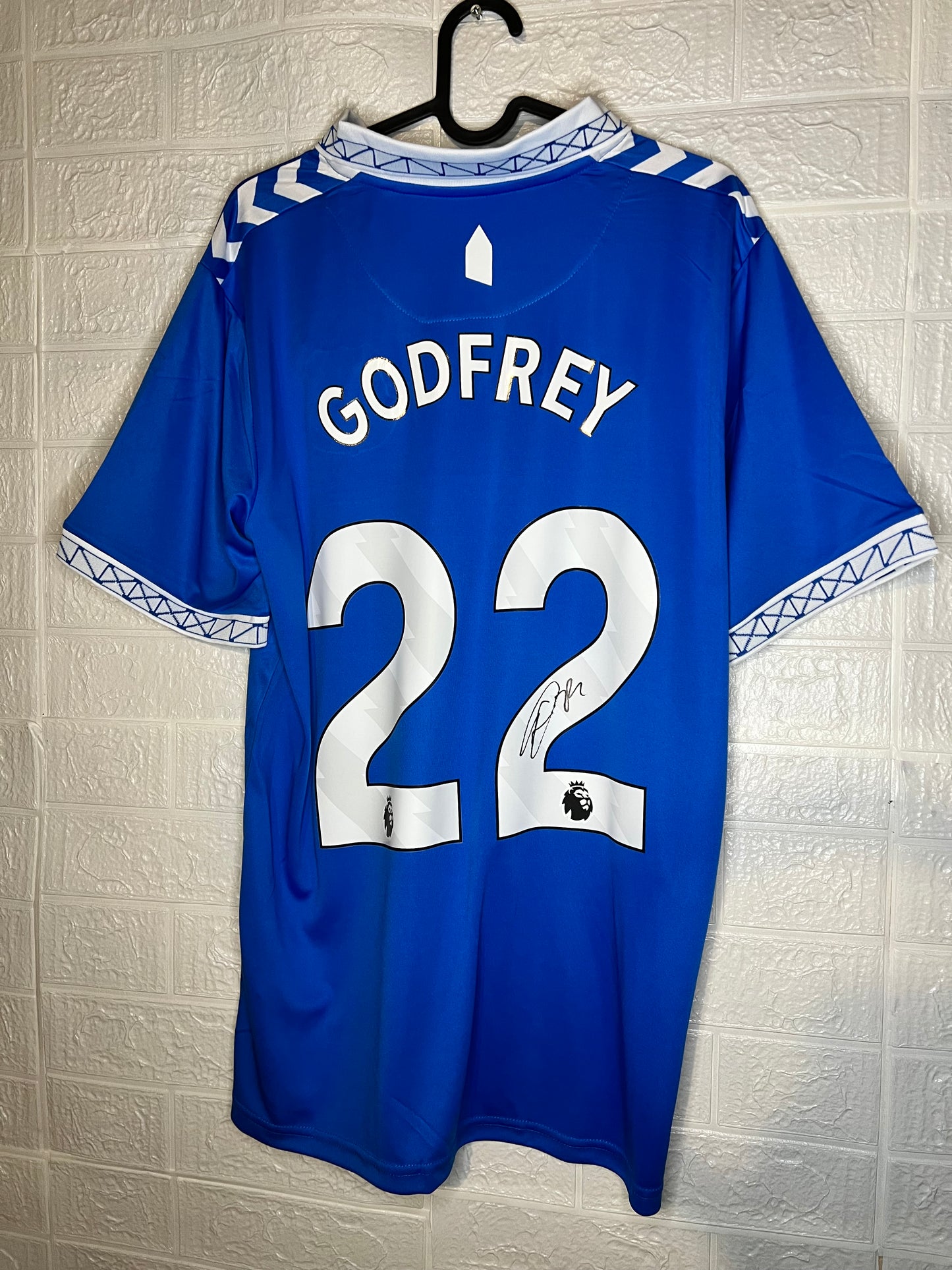 Godfrey signed Everton shirt.